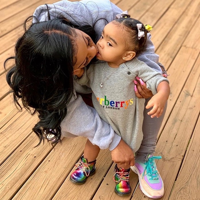 Reign Ryan with her half-sister Reginae Carter.